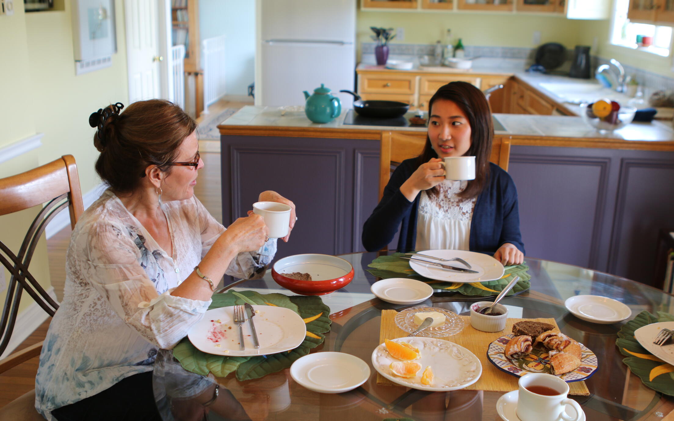 VIU Homestay host talking with VIU student.